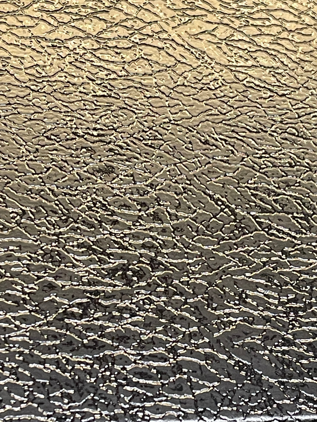 Textured surface with black wavy pattern 