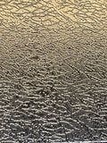 Textured surface with black wavy pattern 