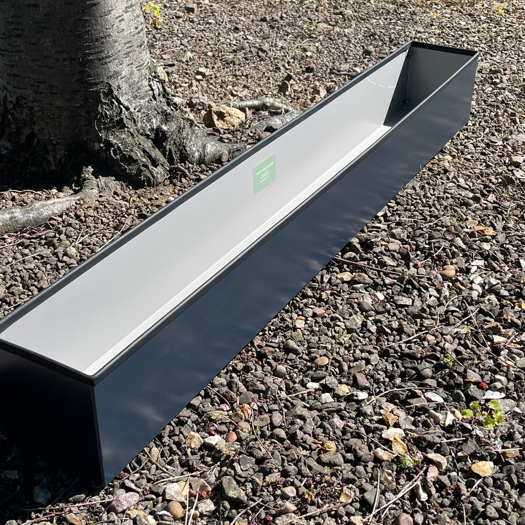 anthracite metal planter unplanted